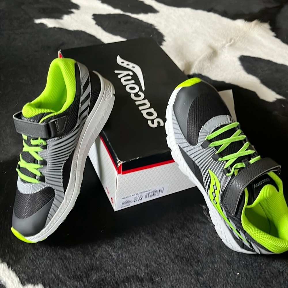 Saucony sneaker, size 6, brand new in box.